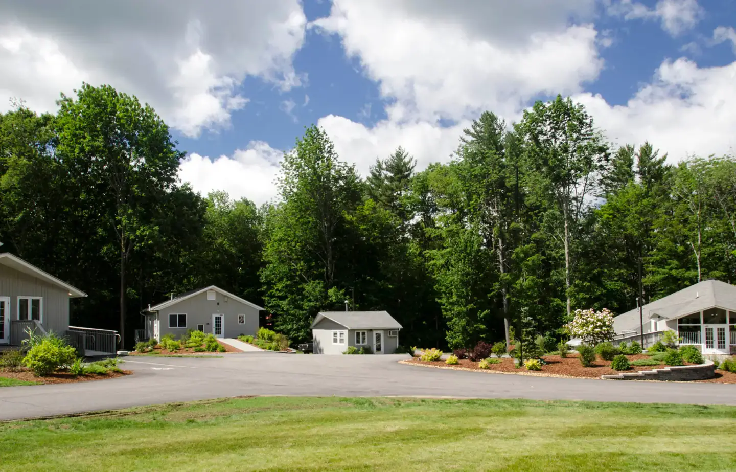 New Freedom Academy campus in Salem, NH with cottages and lawn
