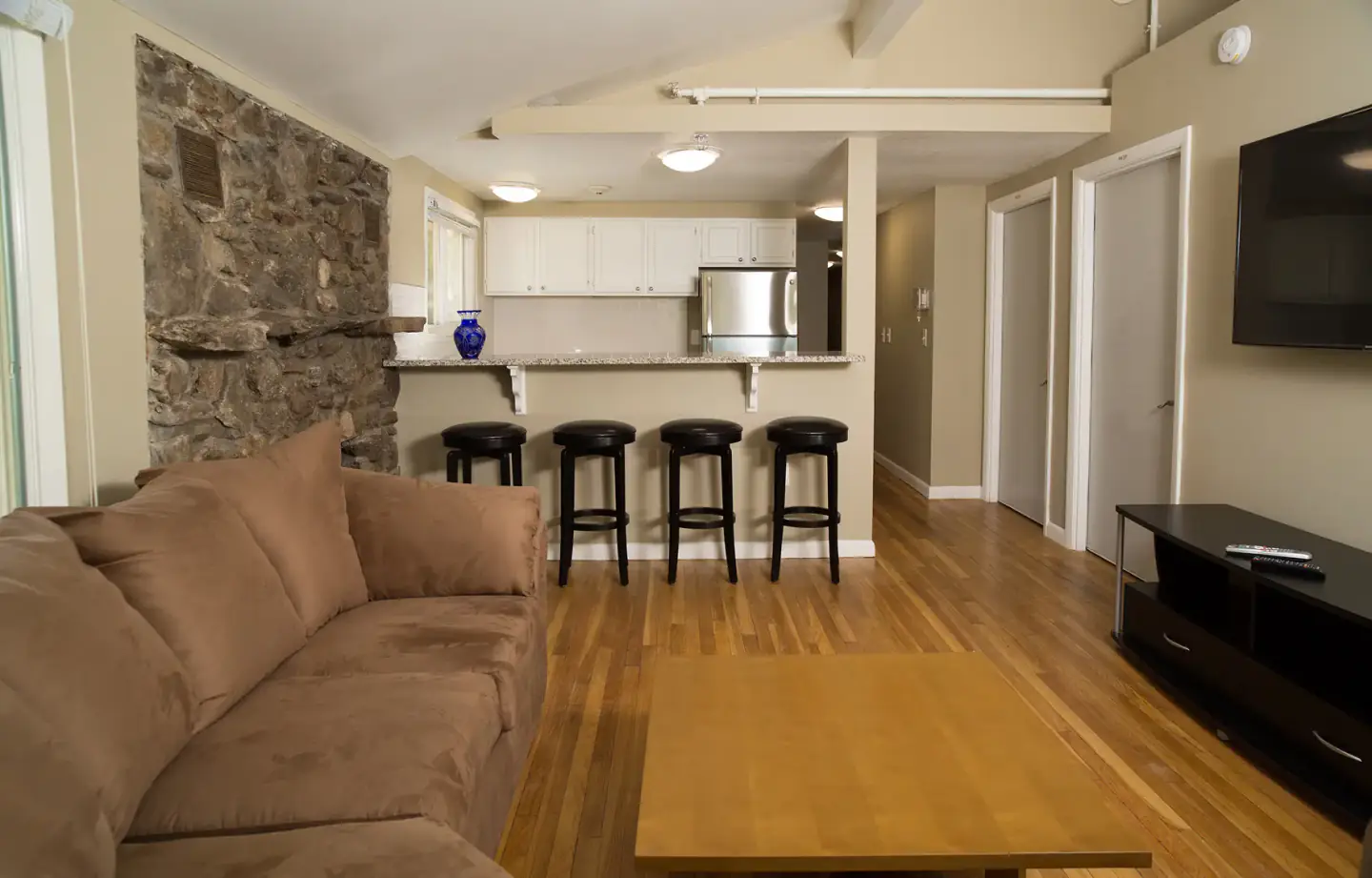 New Freedom Academy lounge and kitchenette with bar seating