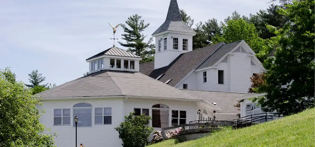 Green Mountain Treatment Center exterior, white buildings with cupola and tower